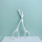 Pink eyebrow trimming scissors with built-in comb - stainless steel, precise grooming tool, creating perfect eyebrows